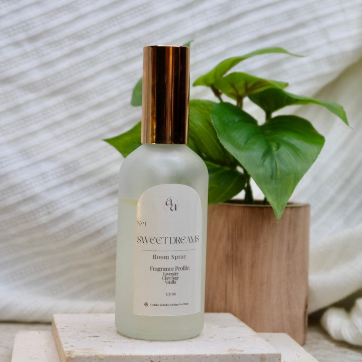 Sweet Dreams room spray in a frosted glass bottle with a copper cap
